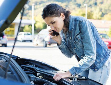 Auto Insurance — Woman Talking On A Phone in Morris Plains, NJ