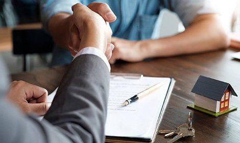 Agent Shaking Hands with His Customer — Stockton, CA — Property Services Agent Shaking Hands with His Customer — Stockton, CA — Property Services