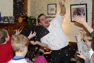 Mr. Magic a confetti snow storm at a child’s birthday party.