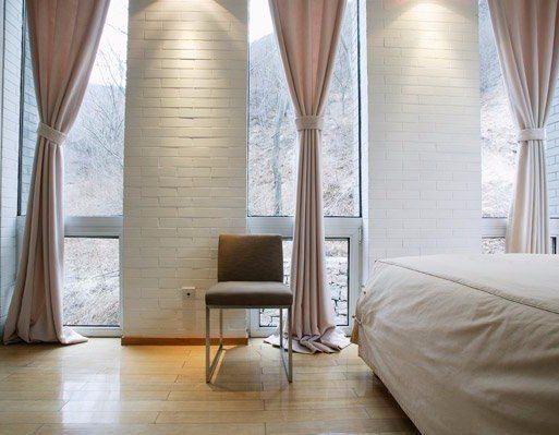 Stylish Custom Window Treatments Within Modern Bedroom