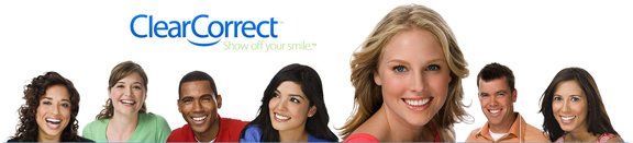 A group of people standing in front of a clear correct logo