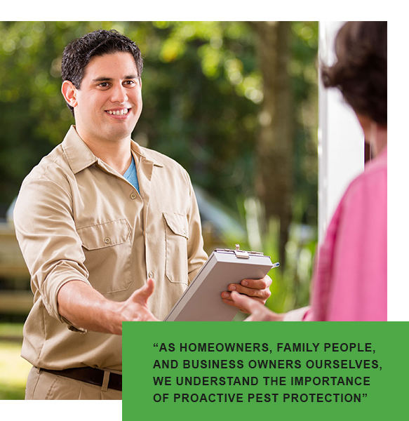 A man is holding a clipboard and talking to a woman