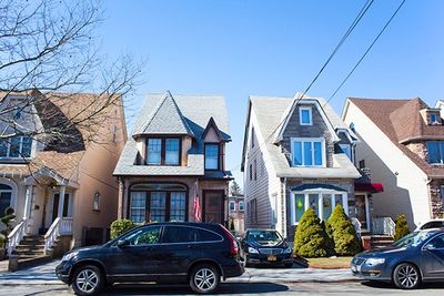 Two skinny row homes in Middle Village Queens.