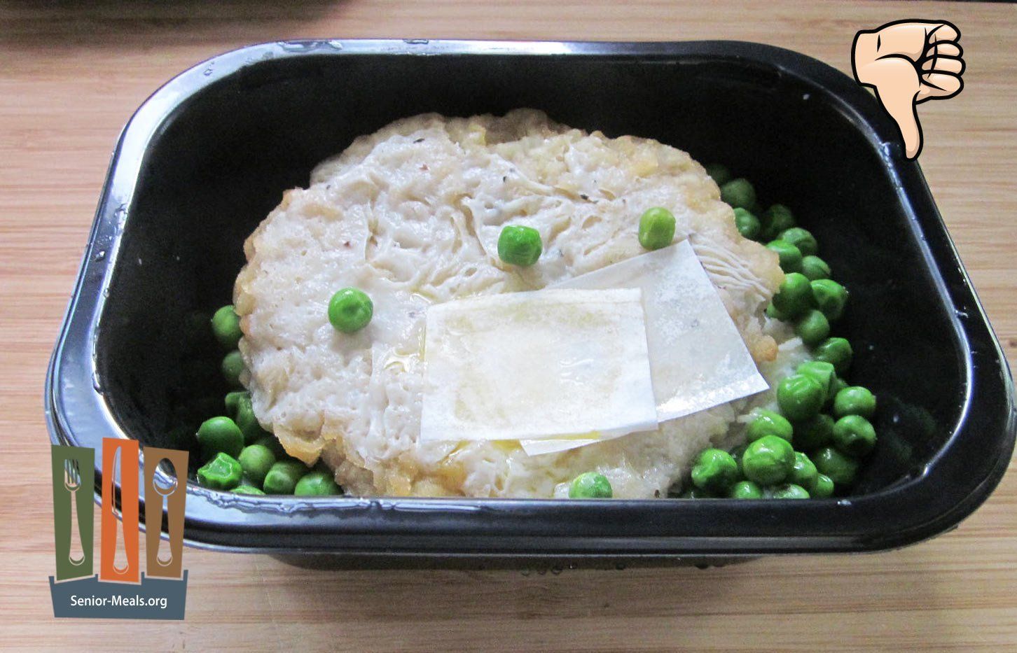 Breaded Chicken Fried Steak - Once Again, they put Butter in the Tray you Can't See to Remove it. The Melted Butter is the Best Tasting Thing in this Meal. P.S. (Don't Eat the Paper from the Butter)