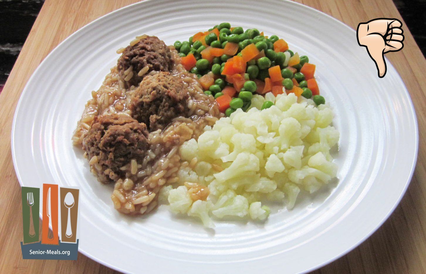 Click to Enlarge Meatballs with Rice and Gravy