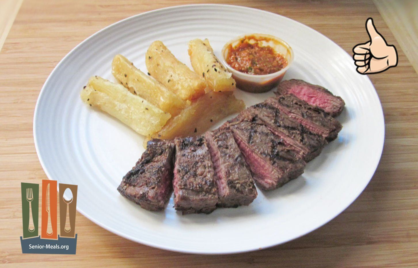 BLT Steak Topped with a Bacon, Roasted Tomato and Arugula Pesto and Yucca Fries