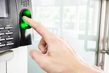 Man using finger print scanner — Access Control in Baltimore, MD