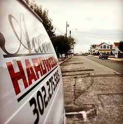 Flooring Contractor — Car with Signage in Newark, DE