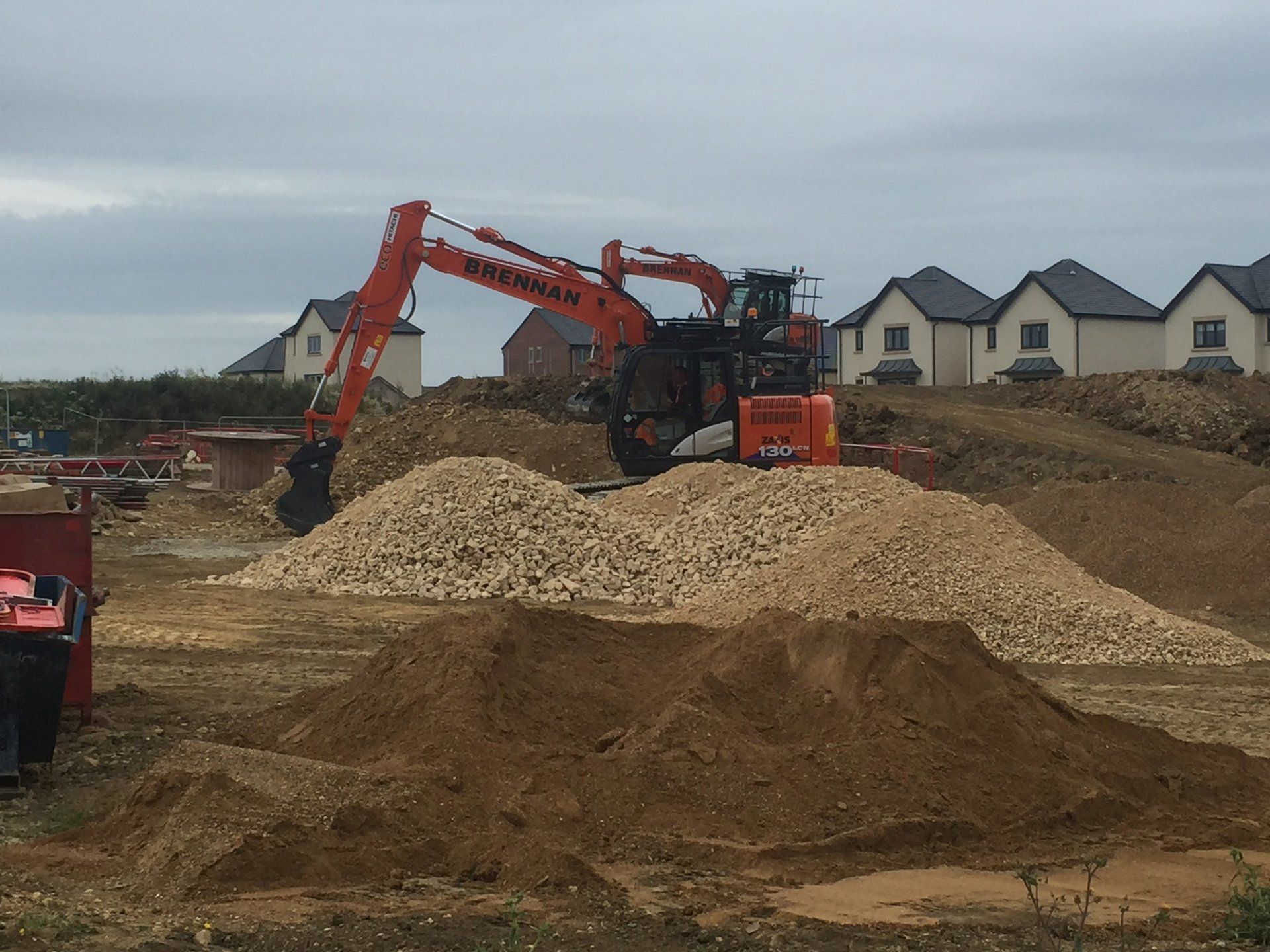mini digger removing the stones