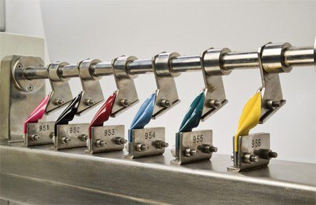 Coloured textiles being prepared for testing
