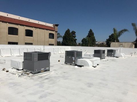 Technician Servicing Heating Boiler — Huntington Beach, CA — Amm Air Conditioning & Heating Technician Servicing Heating Boiler — Huntington Beach, CA — Amm Air Conditioning & Heating
