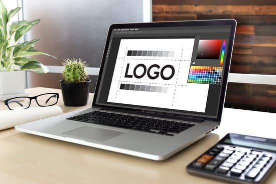 A laptop computer is open to a screen that says logo on it.