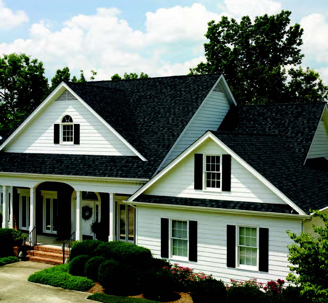 Roofing Services — Luxury House With Black Roof in Canton, MI Roofing Services — Luxury House With Black Roof in Canton, MI