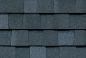 Dark blue asphalt roof shingles.