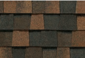 Brown and black asphalt roofing shingles, rectangular shape, overlapping pattern.