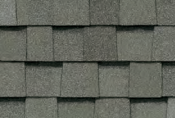 Gray asphalt roof shingles.