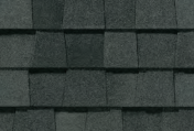 Dark gray asphalt roof shingles.