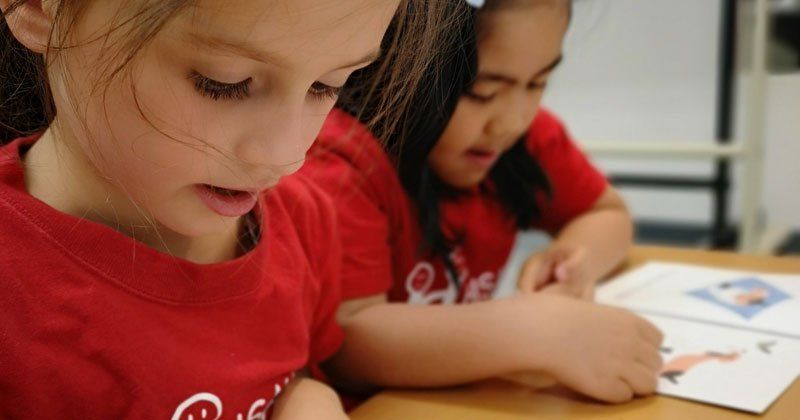 Children reading in pre-school