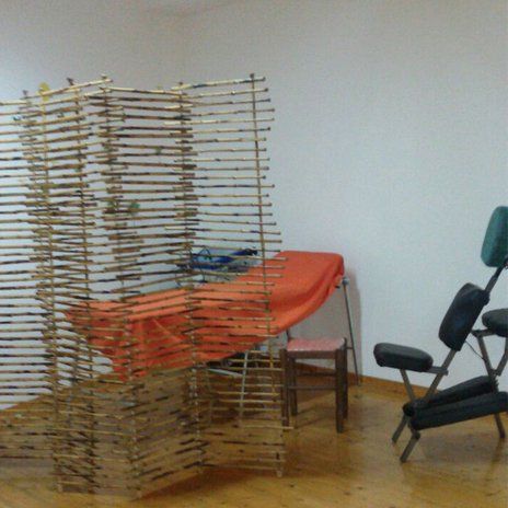 Sedia ergonomica e barella di massaggio