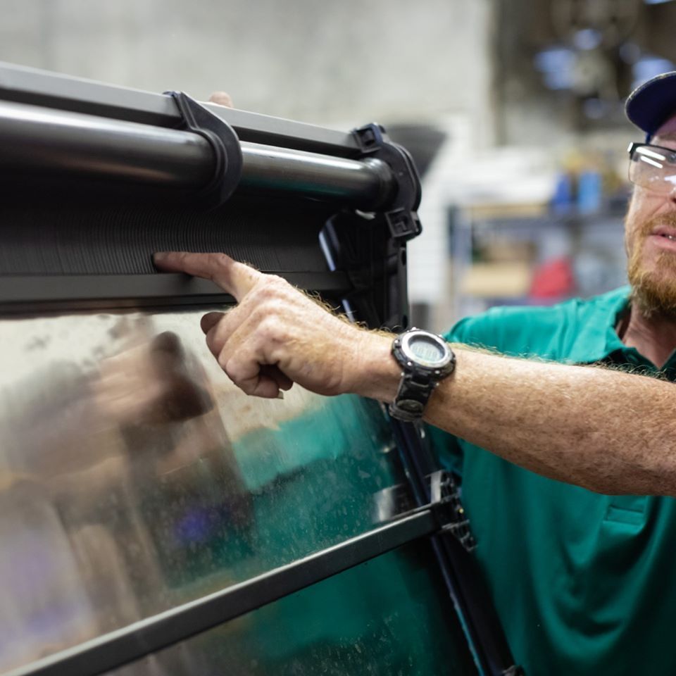Staff Inspecting The Solar Pool Heater — Lutz, FL — Coast to Coast Solar Inc.