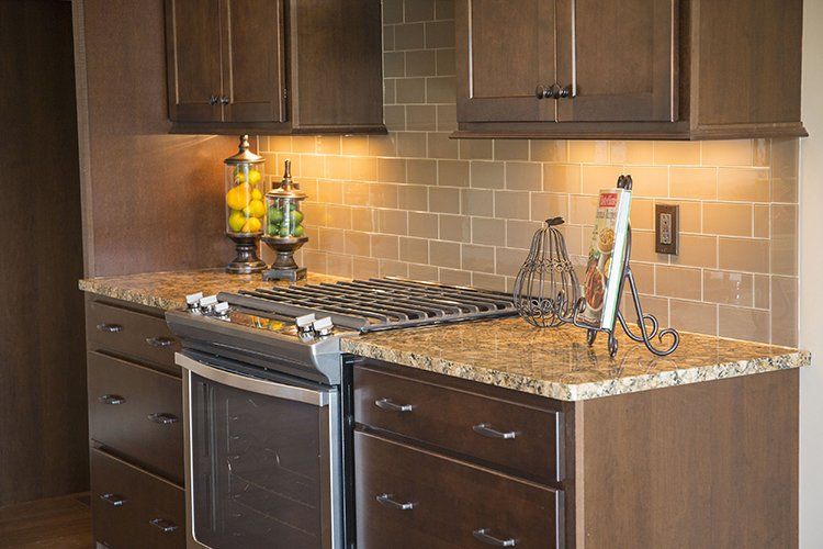 Charming Kitchen Island by Hansman Custom Homes in Mid-Missouri