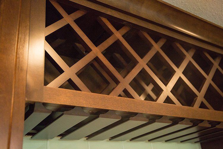 Wine Shelves Above Counter by Hansman Custom Homes in Mid-Missouri