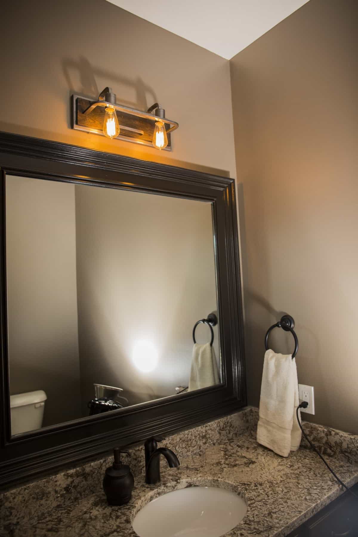 Modern Bathroom Mirror Display by Hansman Custom Homes in Mid-MO