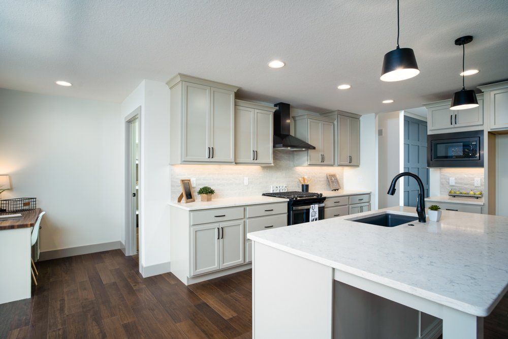 Custom Kitchen With Study Space by Hansman Custom Homes in Mid-Missouri