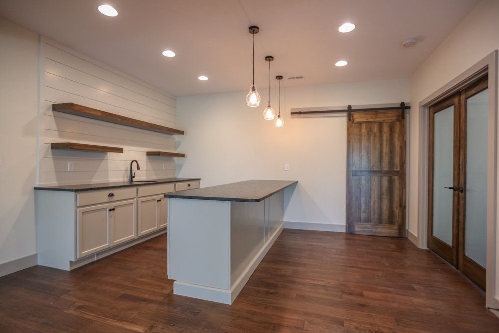 Custom Designed Home Bar by Hansman Custom Homes in Mid-MO