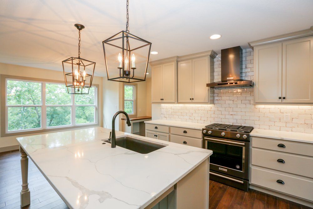 Soft-lit Modern Kitchen by Hansman Custom Homes in Mid-Missouri