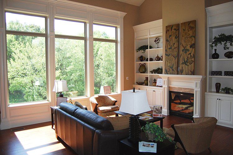 Open Space Living Room With Memorabilia by Hansman Custom Homes in Mid-Missouri