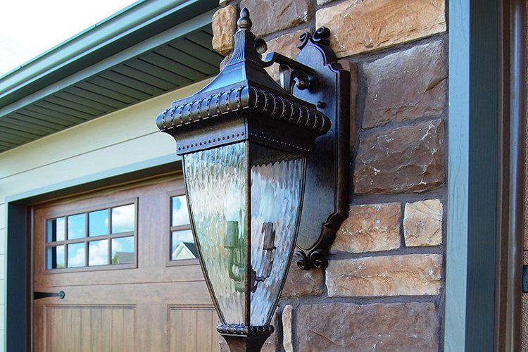 Outdoor Lights & Garage by Hansman Custom Homes in Mid-MO