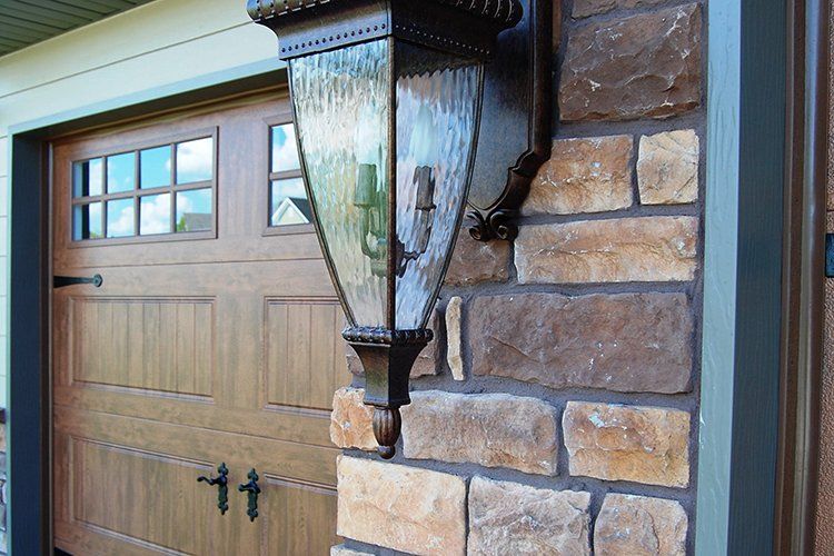 Custom Garage & Lights by Hansman Custom Homes in Mid-MO