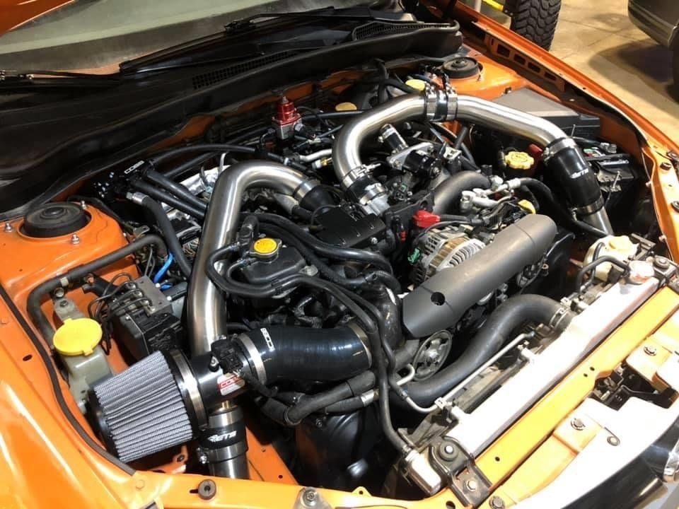 Hood Open White subaru — Auto Service in Edmond, OK