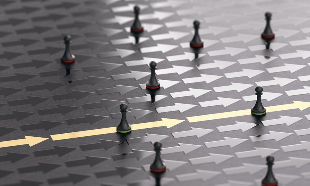 3D illustration of golden and black arrows on dark background with pawns moving from left to right. Concept of surpassing the competiton by moving faster.