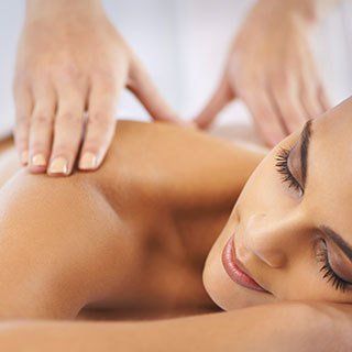 a lady undergoing a massage