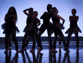 little girl dancers in tutus in silhouette and shadow