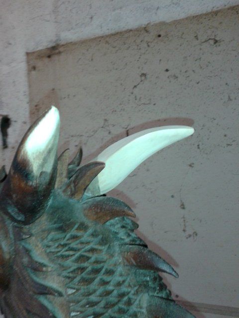 Large dragon carving, came into us with many parts missing including horns, teeth and spines.