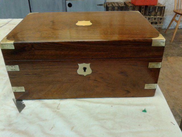 Walnut writing slope, fully restored including a handmade brass key liner in a shield shape, made and fitted by ourselves.