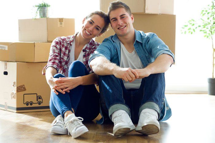 Couple moving into new apartment