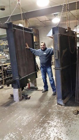 Man with Radiator- Radiator Service in Garfield, NJ