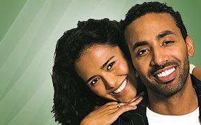 Root Canals — Couple Smiling in Roseville, MI