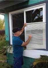 Man Fixing Window — Mobile Screen Repair in Goleta, CA
