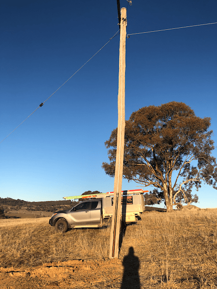 Car on the rice field — ASP Electrical Orange in Emu Swamp, NSW
