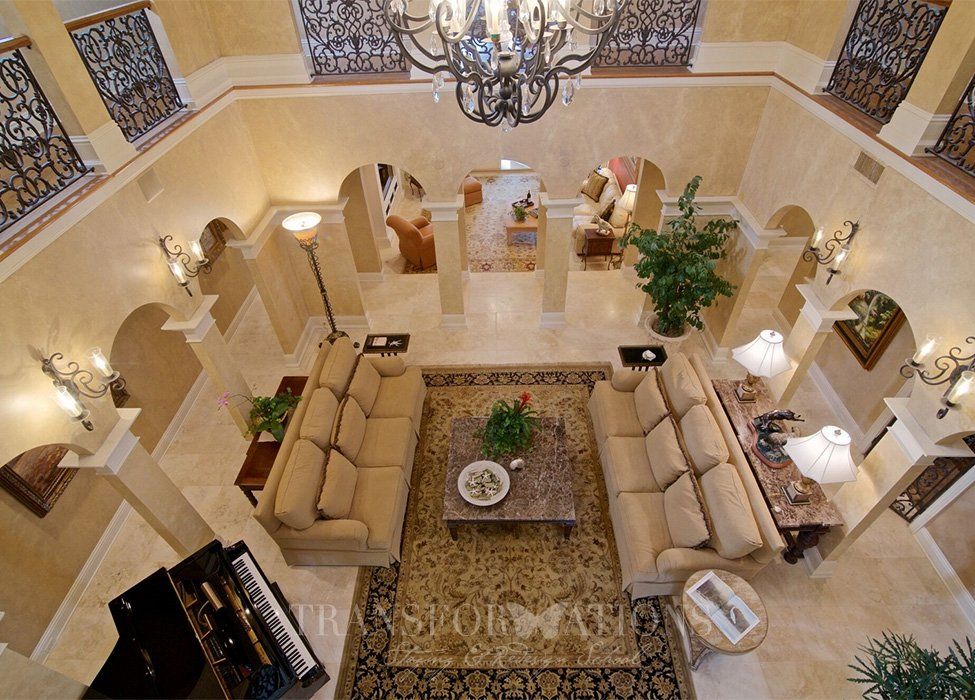 An aerial view of a living room with a piano