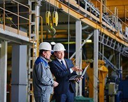 Businessman Talking With The Contractor — New Business Construction in Farmington, NM