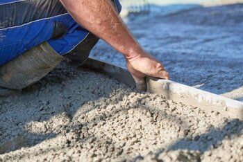 Screeding Cement — Sidewalks in Farmington, NM Screeding Cement — Sidewalks in Farmington, NM