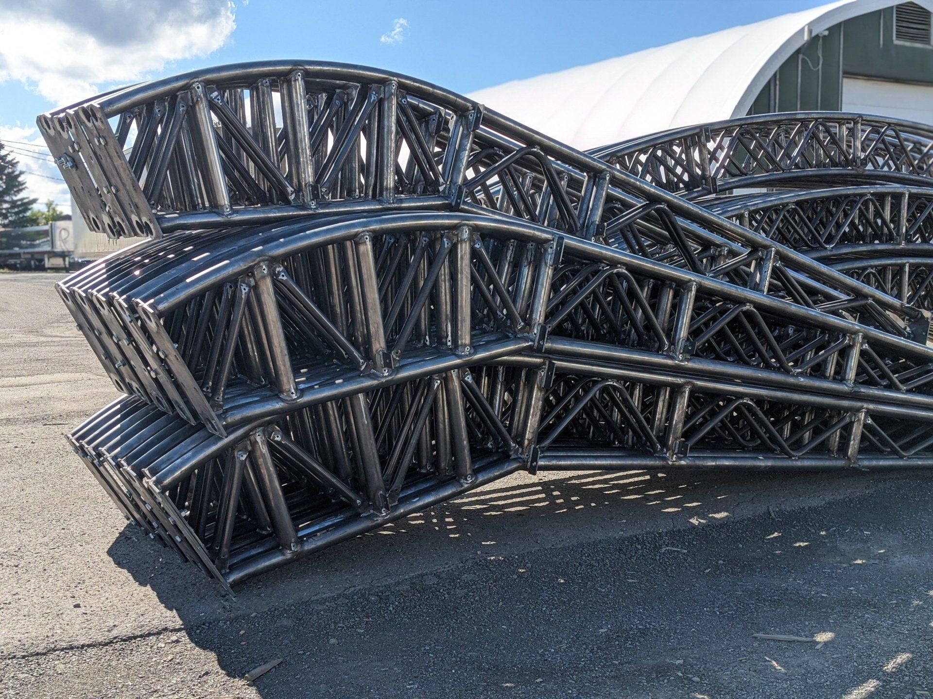 ARCH SPAN BUILDINGS HIGHLY REINFORCED TRUSSED ARCHES - PIN TECHNOLOGY