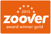 Zoover Award winnaar Goud, 2015. Oranje vierkant met witte tekst en sterren.