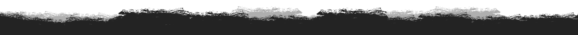 It looks like a black and white painting of a forest.